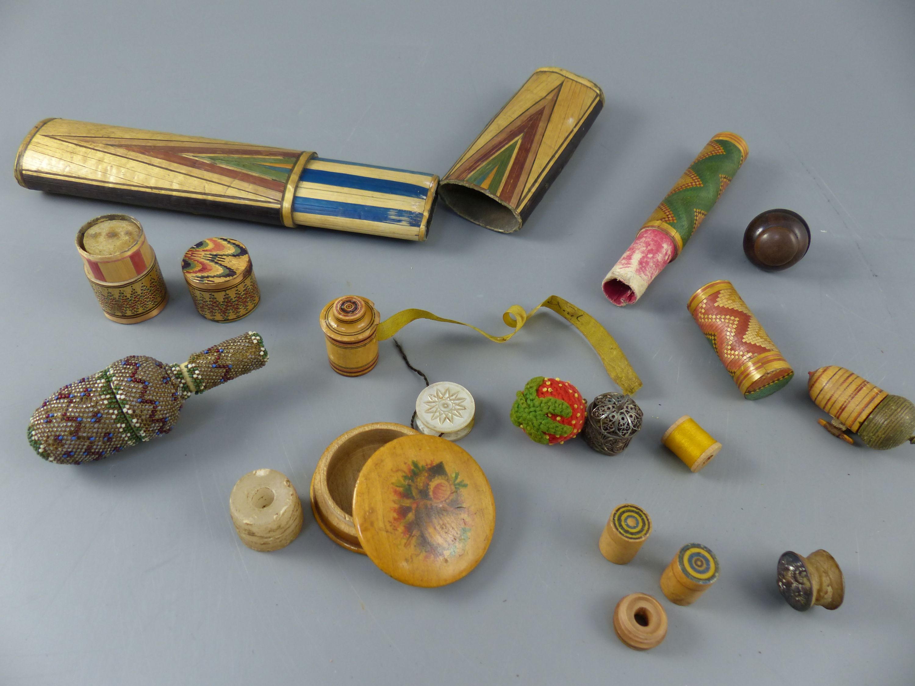 A collection of early 19th century and Victorian sewing accessories